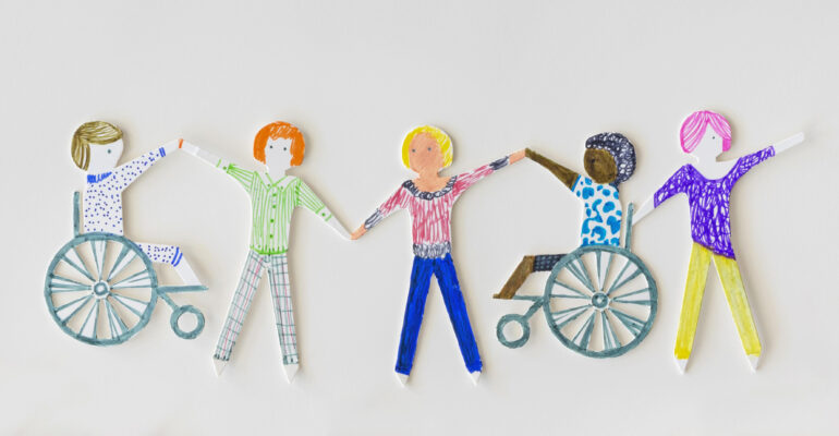 Metadrasi - multi ethnic disabled people community with pencils